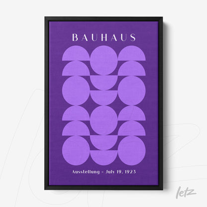 poster print featuring geometric shapes in lilac on a purple background with text about a bauhaus exhibition from 1923 in a black frame