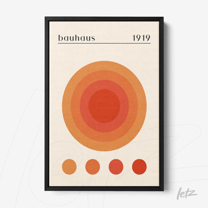 minimalist print featuring concentric circles in warm tones with decorative text 'bauhaus 1919' displayed in black frame on light background