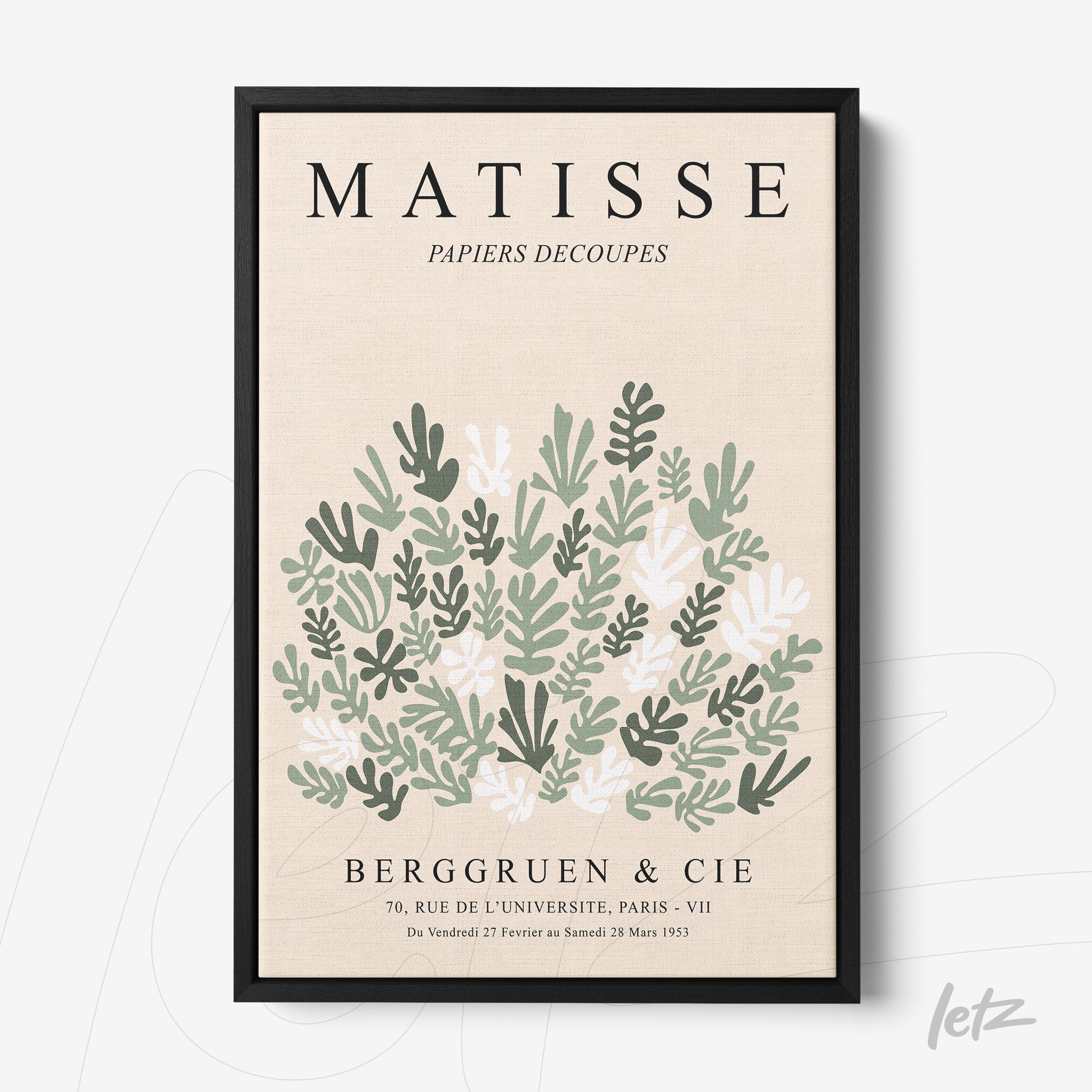 framed wall art featuring modern style leaves design with black frame and light background
