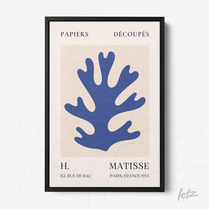 framed abstract art featuring a blue plant shape against a light background