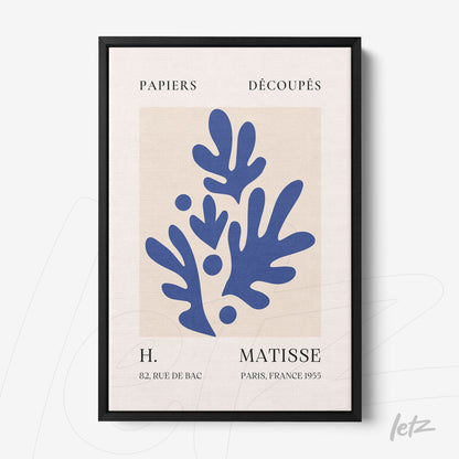 framed decorative art featuring organic shapes in blue tones against a neutral background