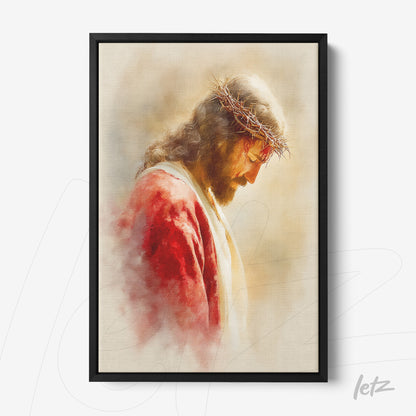 framed artwork of Jesus wearing a crown of thorns with a fine black frame and soft neutral background