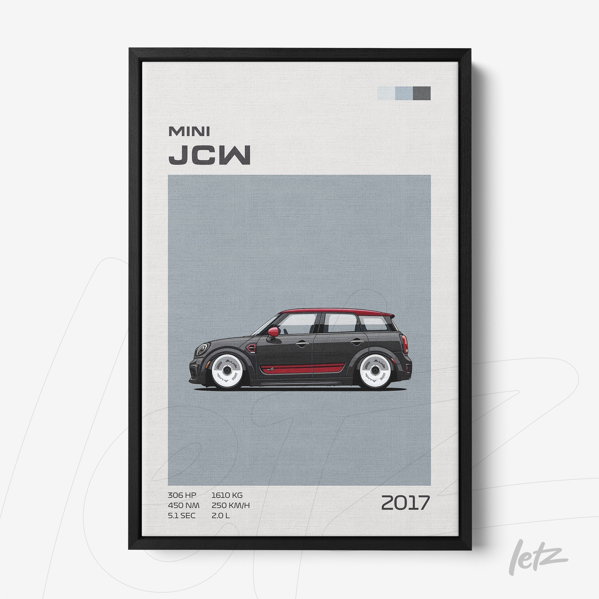 framed wall art of the Mini John Cooper Works car against a gray background