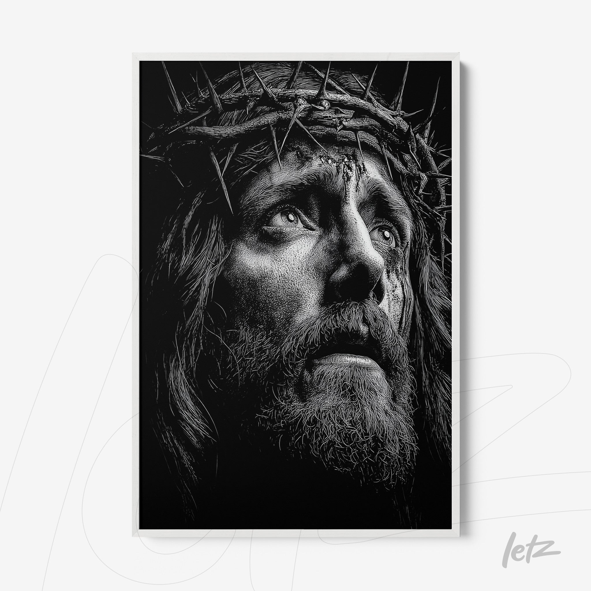 framed black and white portrait of Christ crowned with thorns