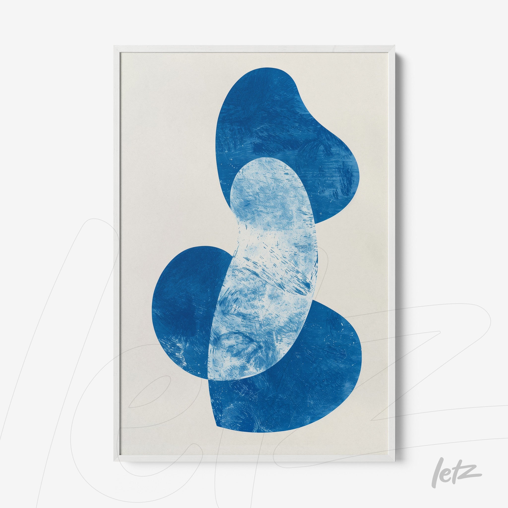 framed abstract art in shades of blue with organic shapes on light background