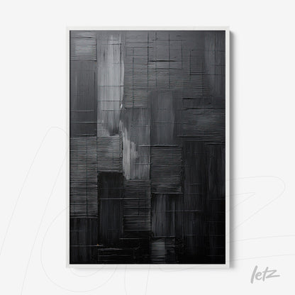 canvas artwork featuring abstract black and white design with layered textures and geometric shapes, framed in white