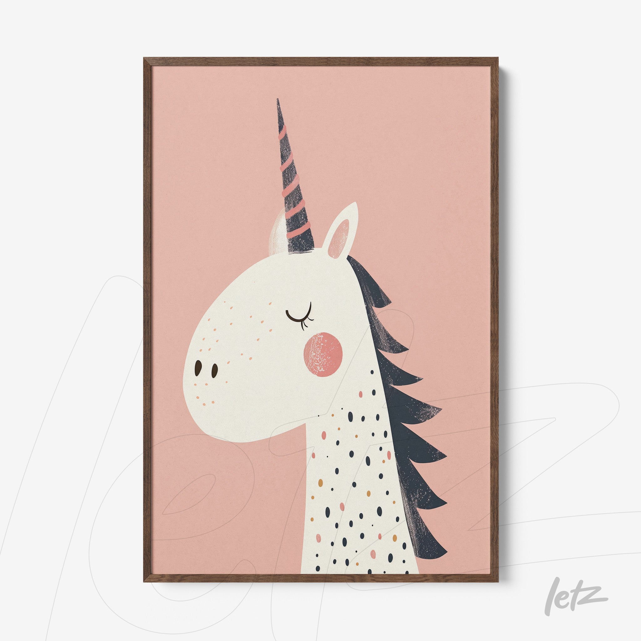 framed artwork featuring a unicorn illustration against a pink background with dark wood frame