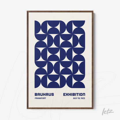 framed abstract geometric art in blue with dark wood frame
