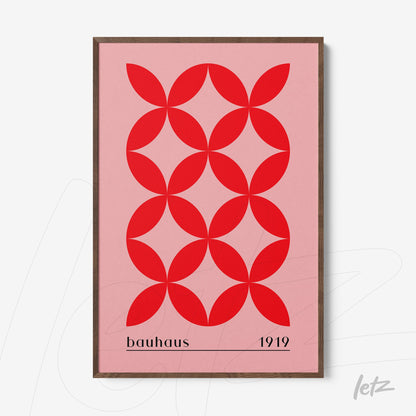 canvas print featuring red geometric pattern in bauhaus style with dark wooden frame