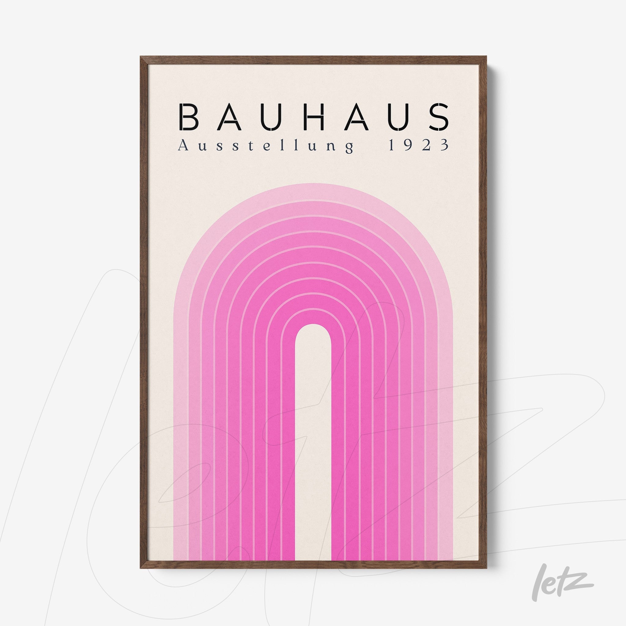 framed wooden art with pink geometric design and text bauhaus ausstellung 1923