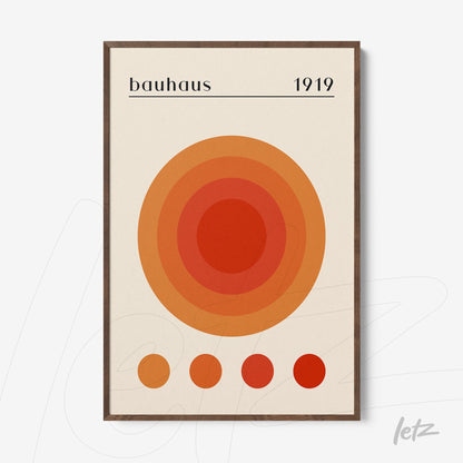 minimalist bauhaus movement art with concentric circles in shades of orange and dark wooden frame
