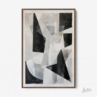 abstract artwork in black and white with a light wooden frame