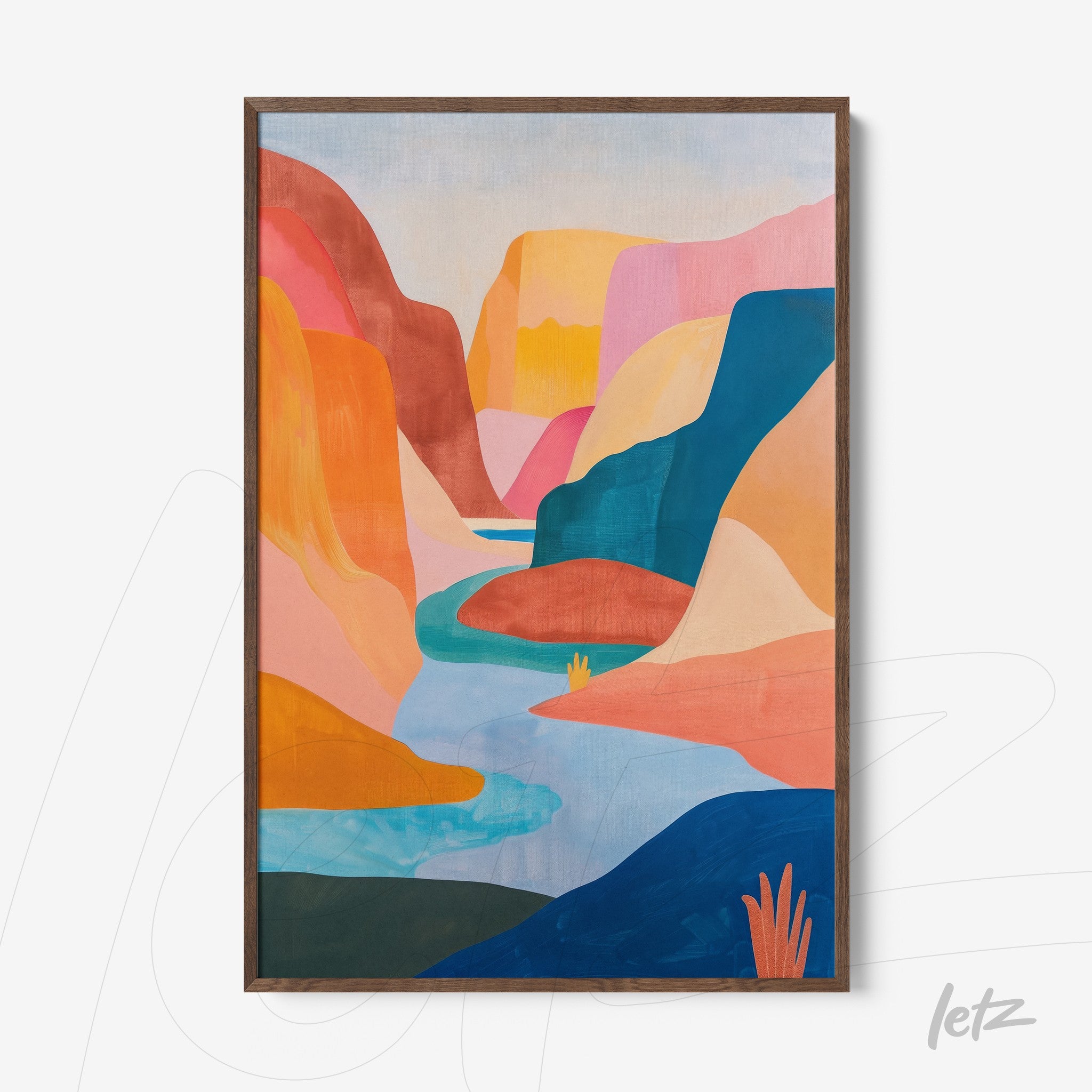framed abstract art of colorful canyon landscape with light wood frame
