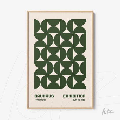 bauhaus style poster print featuring green geometric patterns in a light wood frame