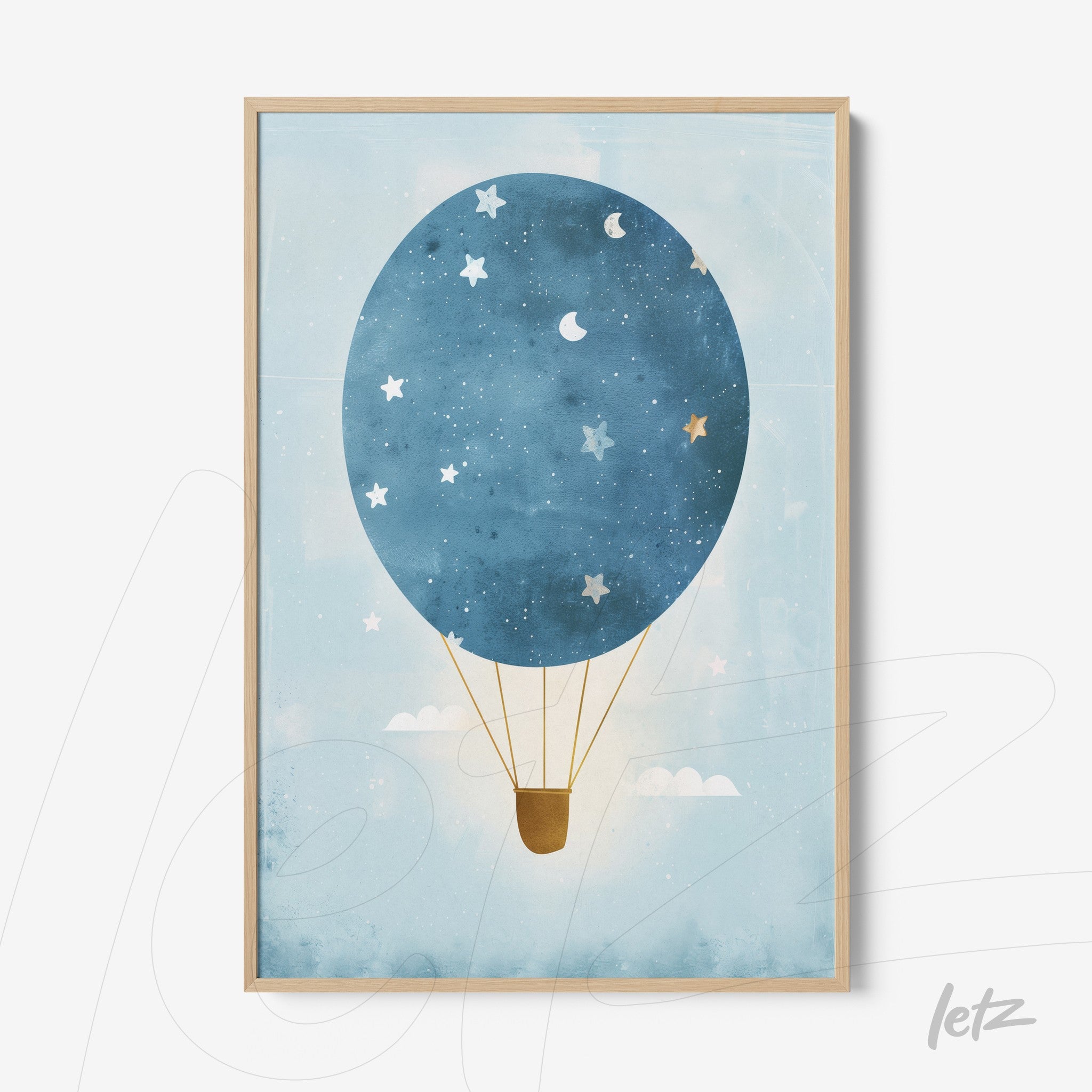 framed artwork of a blue hot air balloon against a starry sky with light wood frame