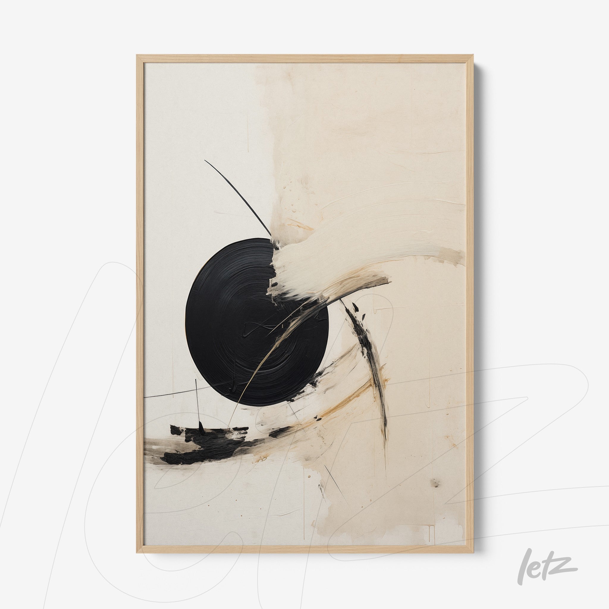 abstract wall art featuring circular black shapes on beige background, framed in light wood