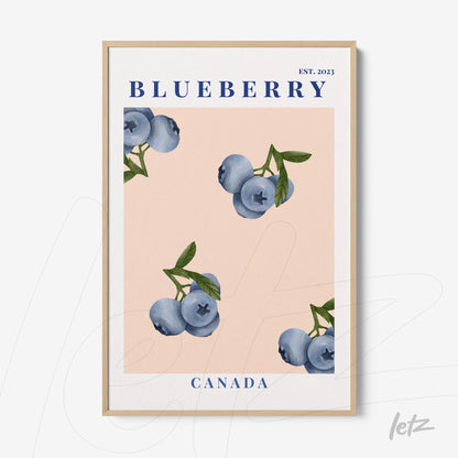 framed art featuring blueberries on a light pink background with a light wood frame