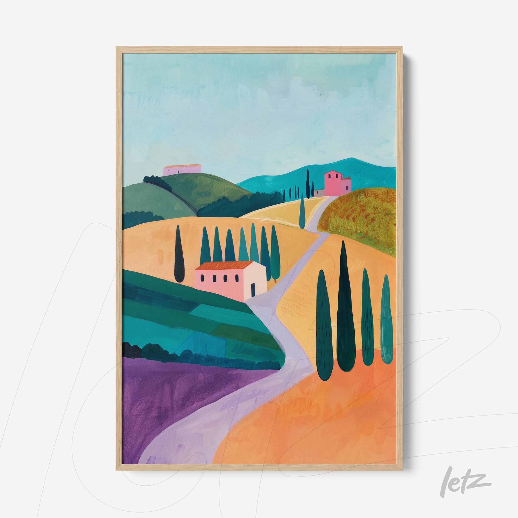 framed artwork featuring a colorful rural landscape with green hills, pink houses, and a path bordered by tall trees