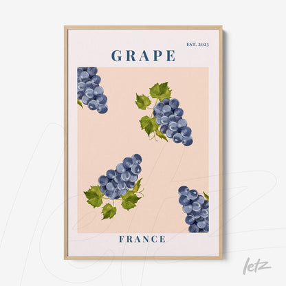framed artwork featuring clusters of grapes on a pink background with a light wood frame