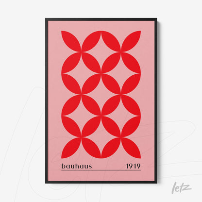 poster featuring red geometric design on a pink background with black frame