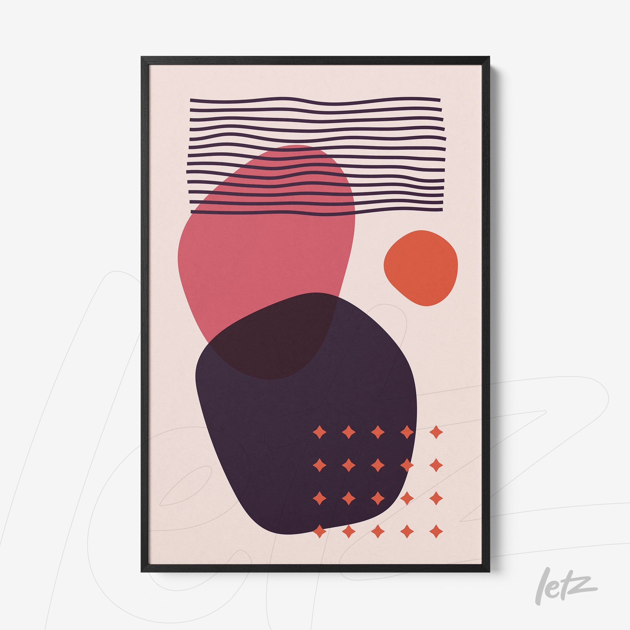 framed abstract geometric art with thin black frame displayed on white wall