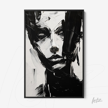 abstract wall art in black and white depicting a human face with a black frame