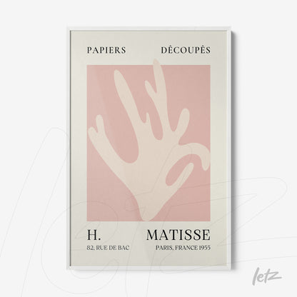 framed contemporary art featuring a stylized hand on a light pink background with a white frame