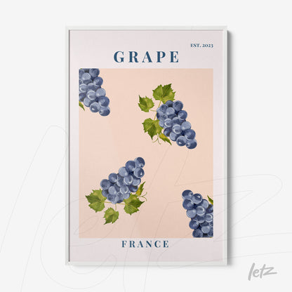 framed artwork featuring illustrated grapes on a pink background with blue text and white frame