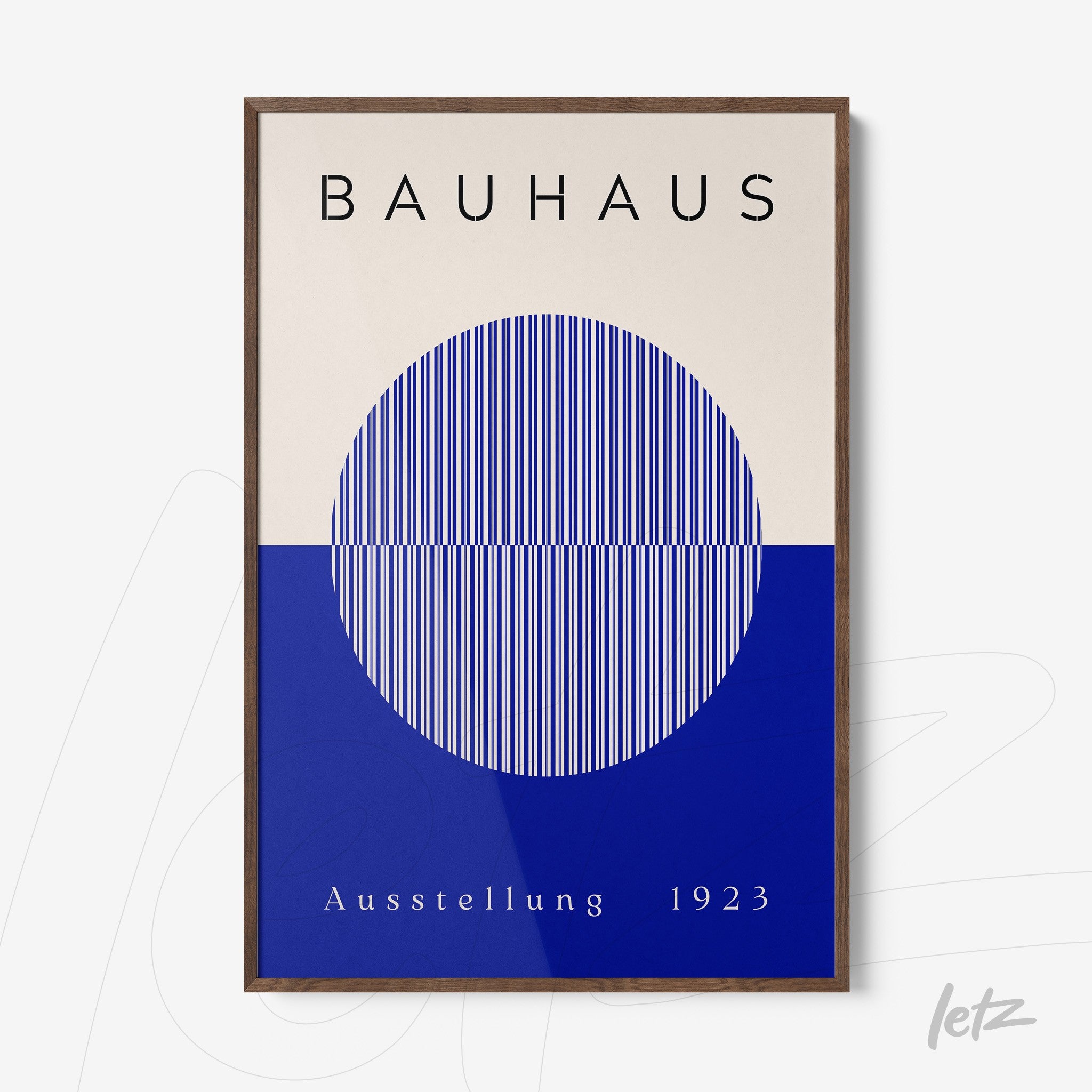 poster featuring geometric bauhaus art displayed in a dark wood frame