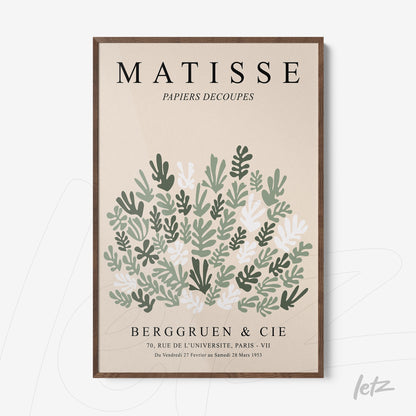 framed wall art featuring modern foliage design on light beige background with dark wooden frame