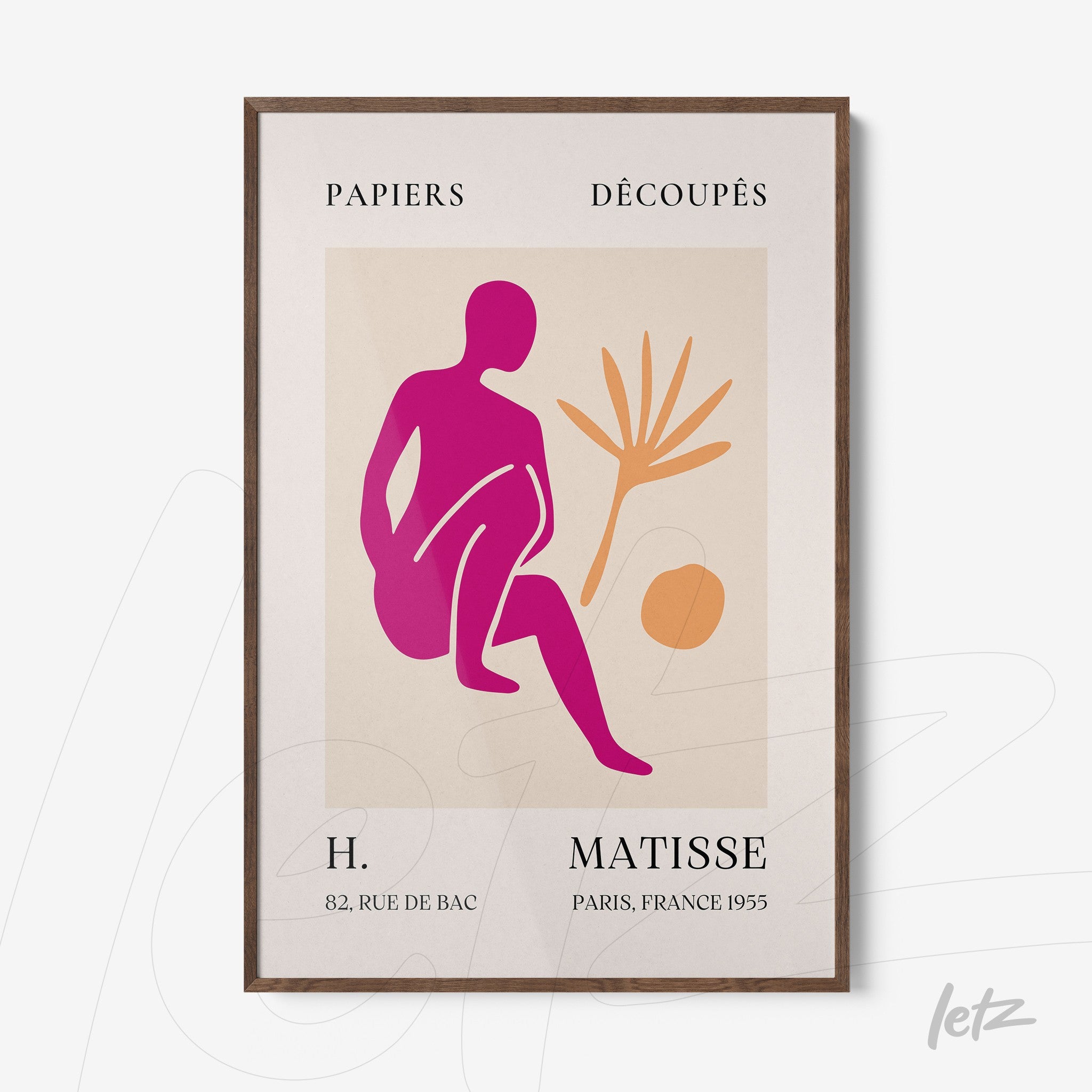 framed wall art featuring modern illustration of a seated figure in shades of pink and orange with dark wood frame