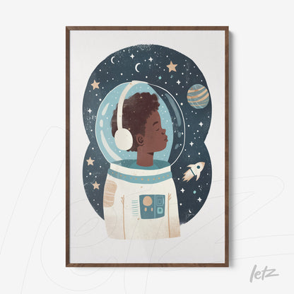 framed artwork of a young astronaut boy in a starry background with dark wood frame