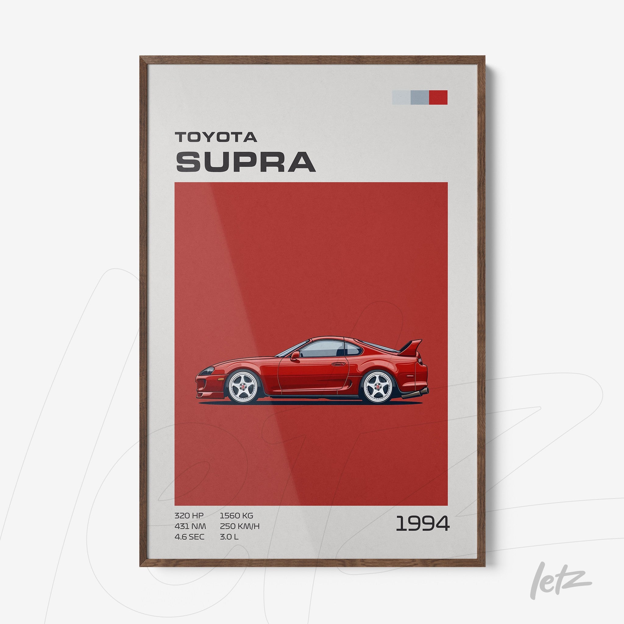 framed wall art featuring a 1994 Toyota Supra on a red background with dark wooden frame