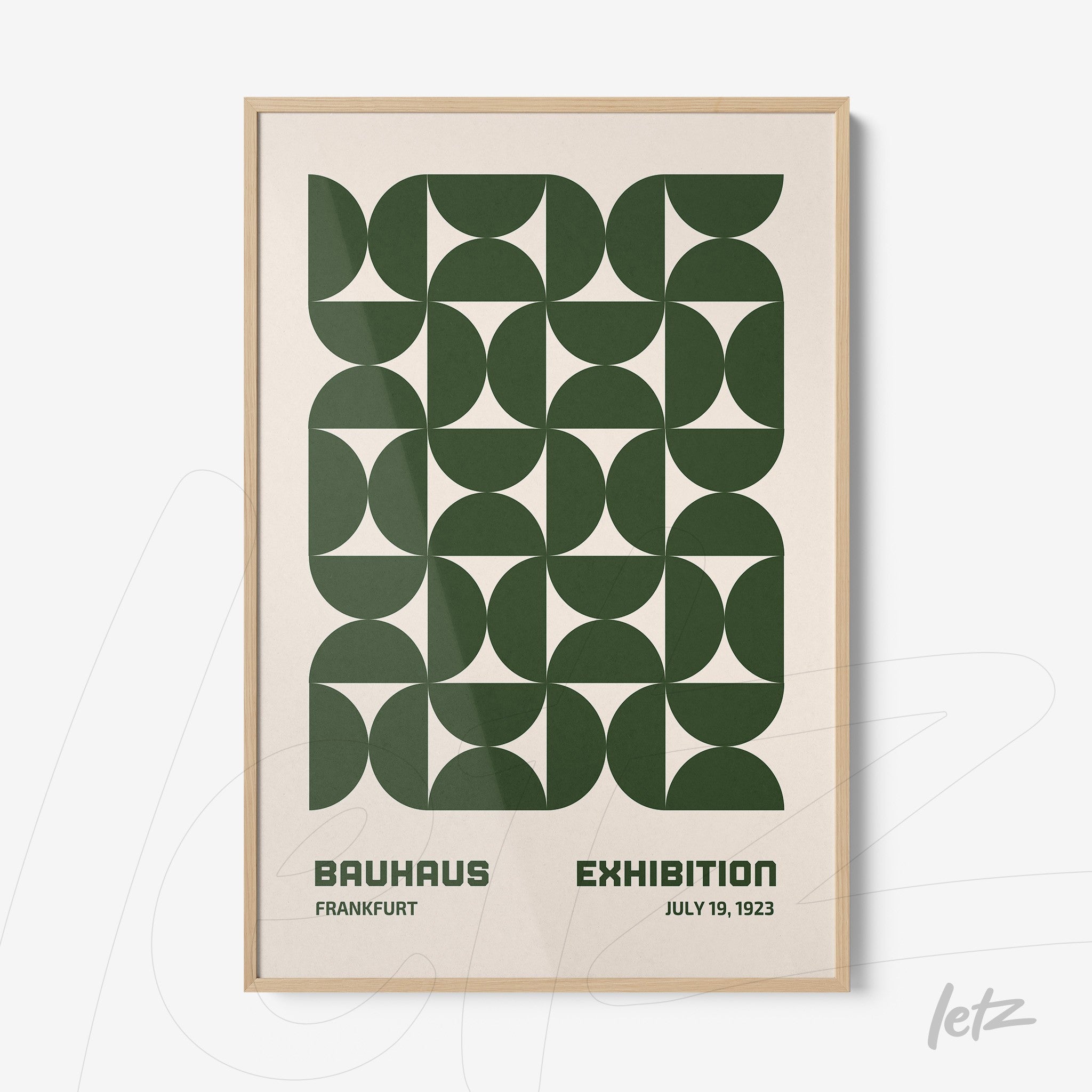 poster print with green geometric pattern in light wood frame