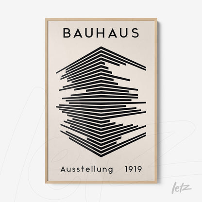 poster print with black geometric design on a cream background in a light wood frame