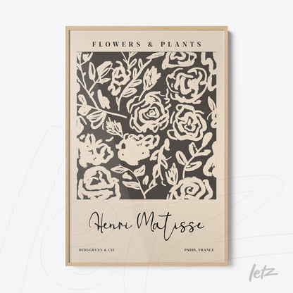 framed wall art featuring stylized floral design with light wood frame and beige background