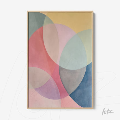 abstract wall art featuring pastel colors and circular shapes in a light wooden frame