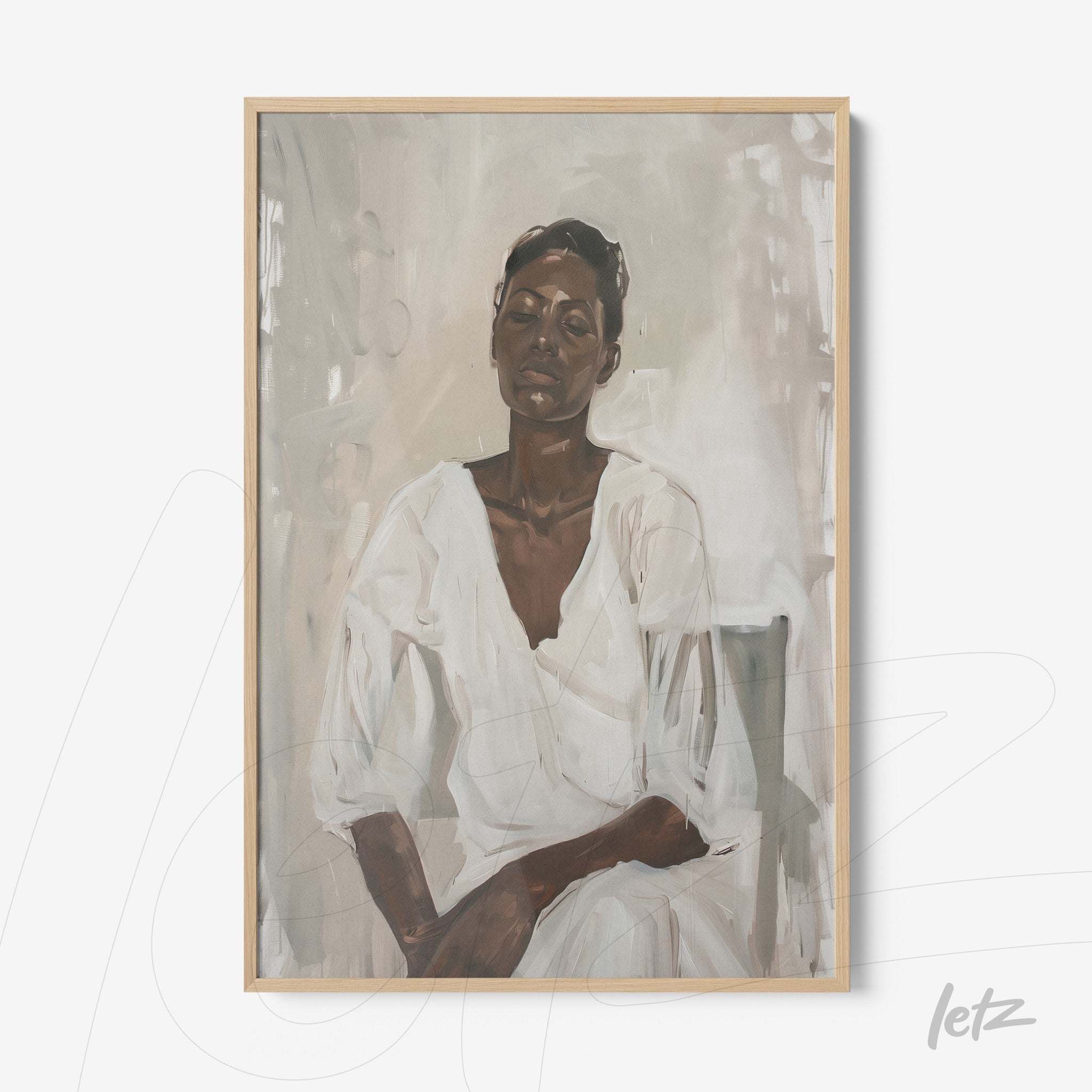 framed portrait of a woman in neutral tones with light wood frame