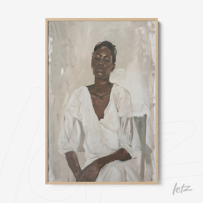 framed portrait of a woman in neutral tones with light wood frame