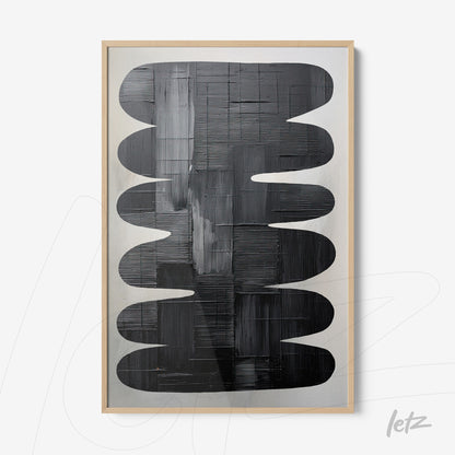 abstract wall art in black tones with light wooden frame