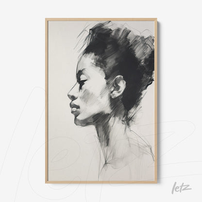 framed wall art featuring a pencil sketch portrait of a woman in profile with a light wood frame