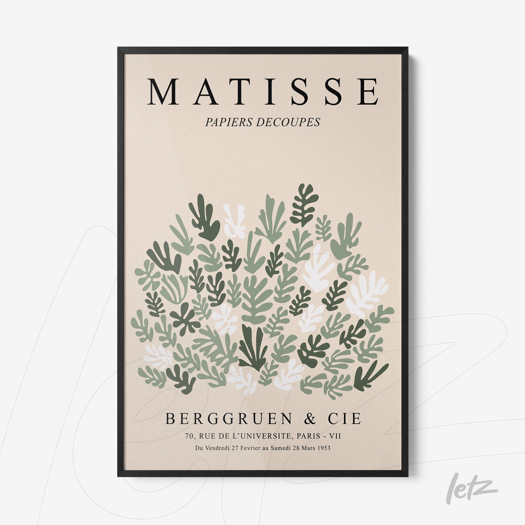 framed wall art featuring stylized leaves in shades of green and pink on a beige background