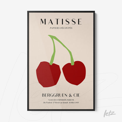 framed wall art featuring abstract red cherries in modern style with black frame
