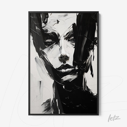 abstract wall art in black and white featuring a female face in black frame