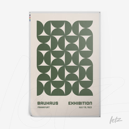 poster print featuring green geometric design inspired by Bauhaus style with text on exhibition from 1923