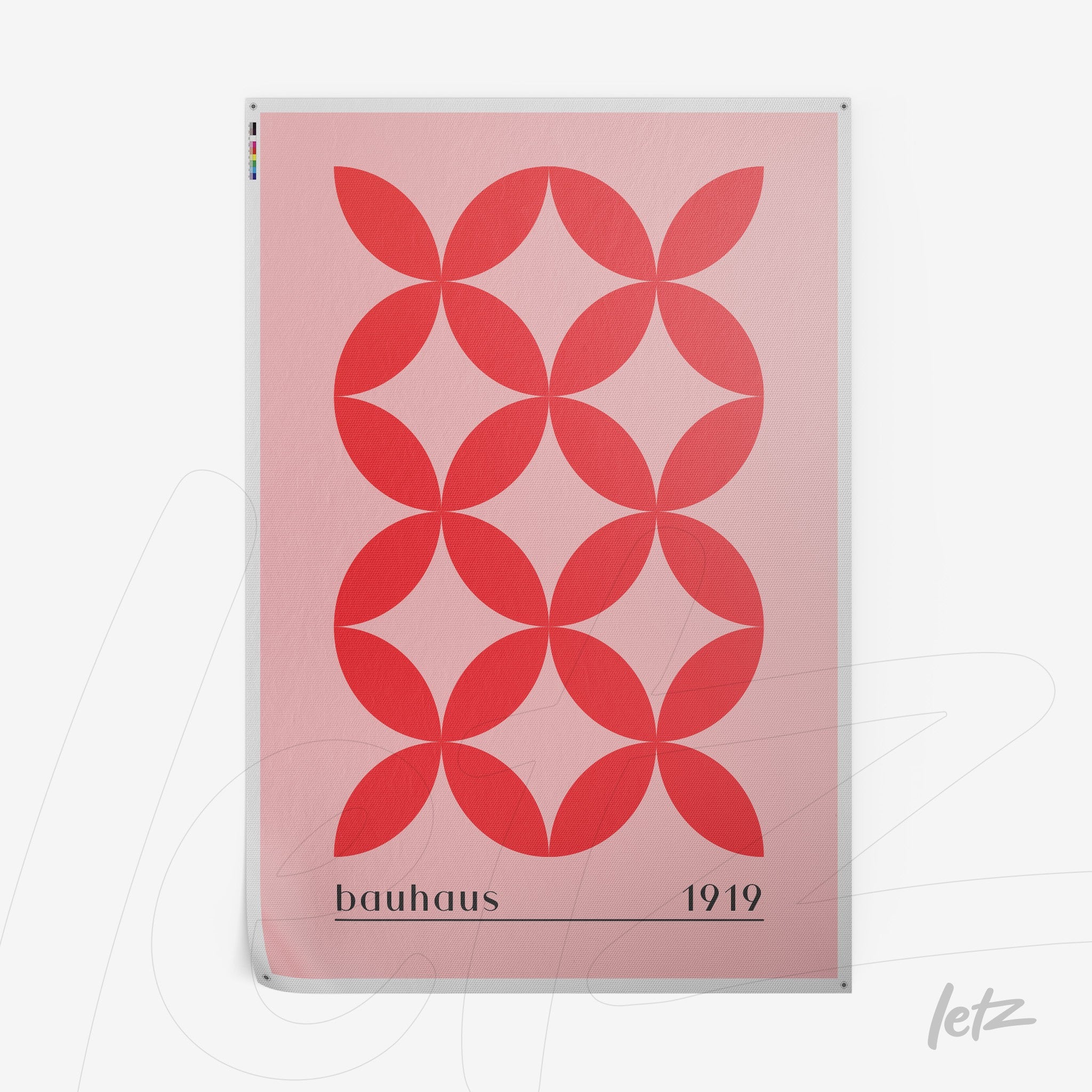 poster print featuring red geometric circle pattern on a pink background with text 'bauhaus 1919'