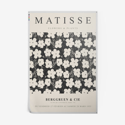 framed wall art featuring black and white graphic design of stylized flowers on a neutral background with vintage typography