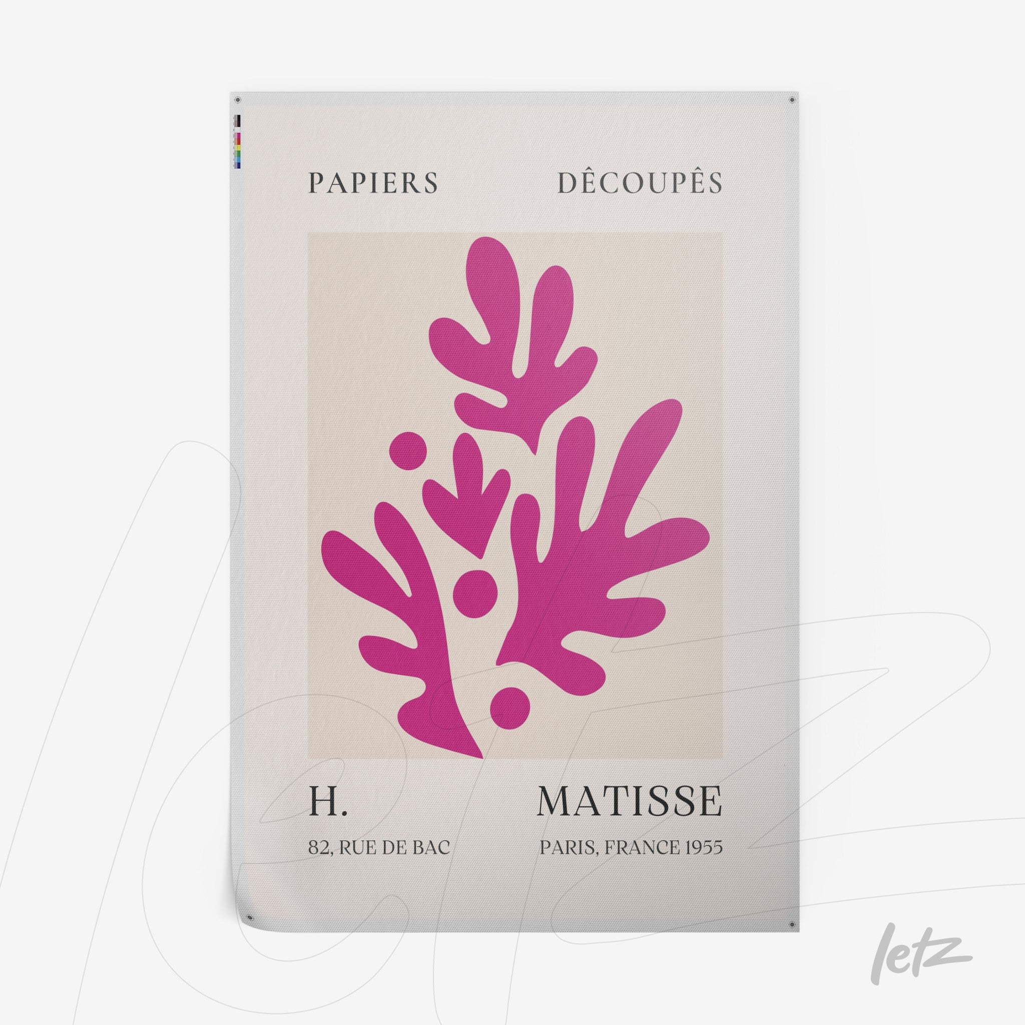 framed artwork featuring cut-out design by Henri Matisse in a light background with vibrant pink shapes