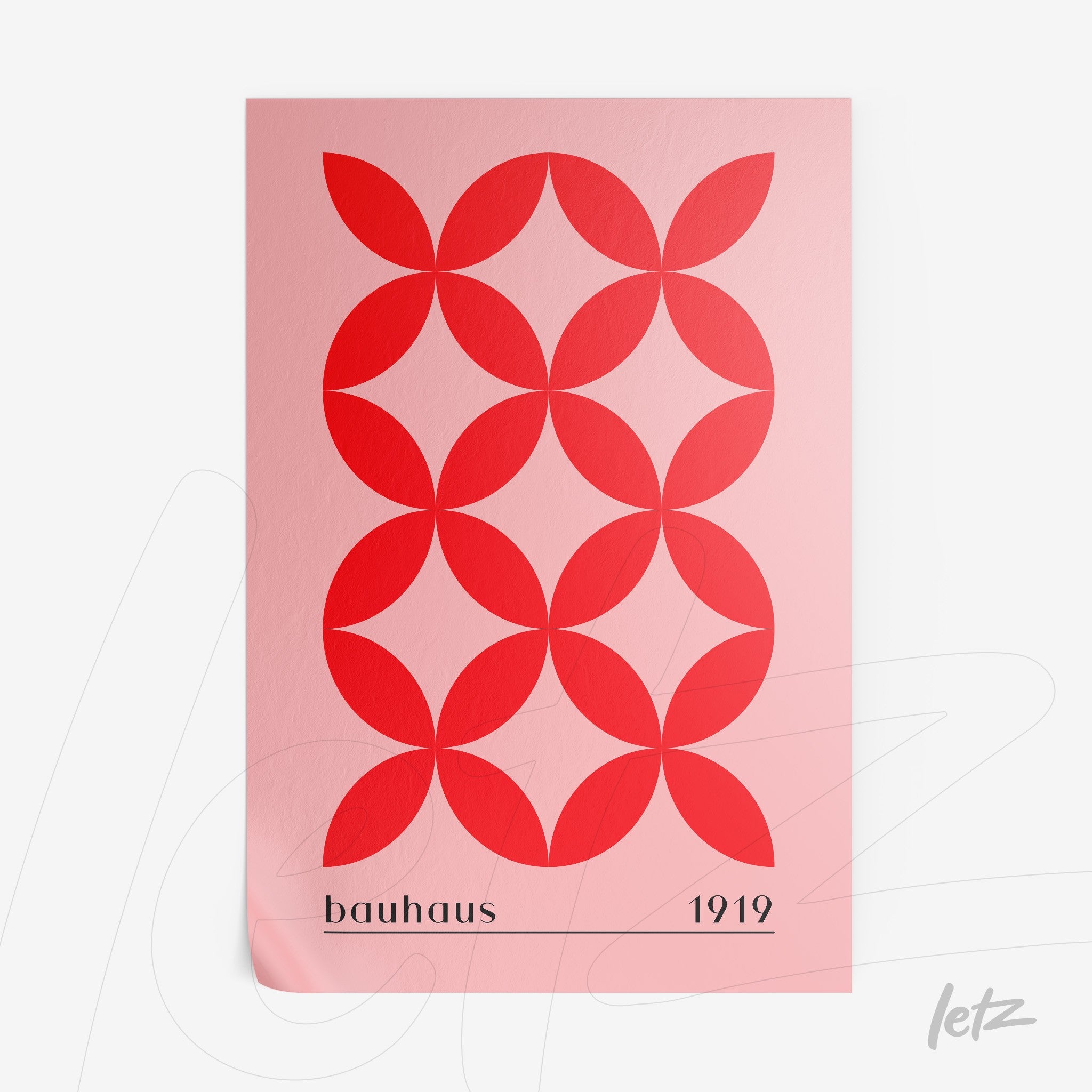 poster featuring geometric pattern of interlocking red circles on a light pink background with bauhaus 1919 text
