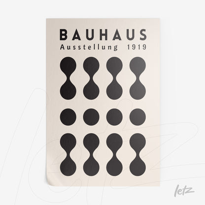 poster featuring geometric Bauhaus style design from 1919 with black shapes on a cream background